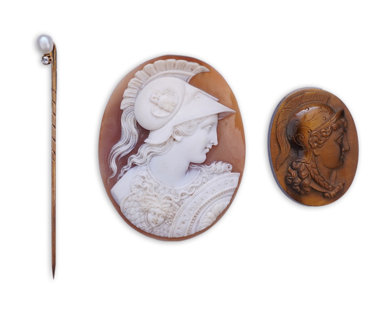 Two cameos and a stick pin, 19th century